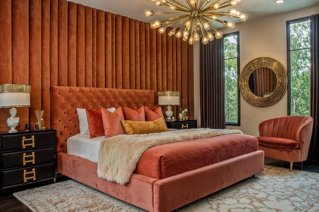 Modern glam in a comfortable terracotta bedroom by Decorilla