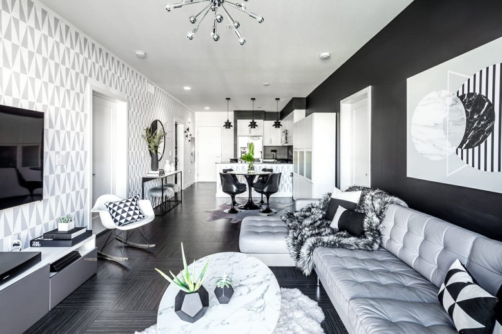 Black and white modern bachelor pad design by Decorilla