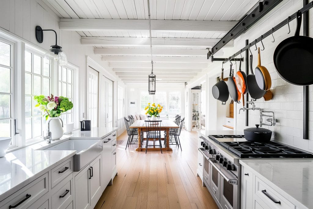 The hanging pan rack keeps this kitchen by Decorilla organized