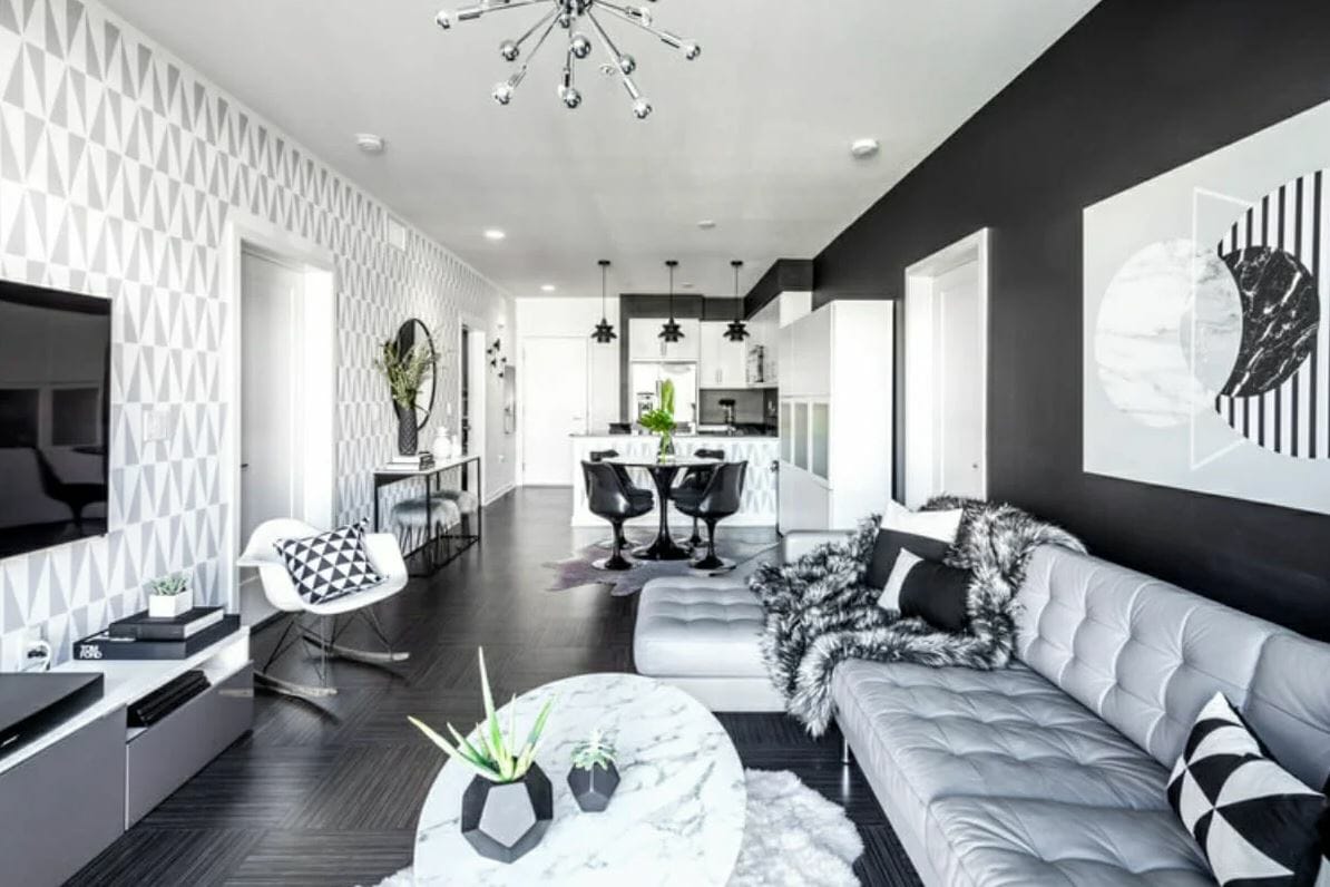https://www.decorilla.com/online-decorating/wp-content/uploads/2020/07/Color-coordinated-black-and-white-modern-apartment-design-with-modern-apartment-decor-by-Michelle-B.jpg