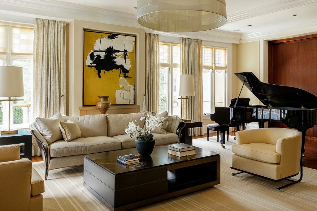 Oversized chandelier gives character to this luxury interior design living room by Decorilla