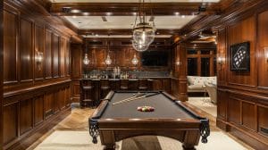 Basement game room and lounge design by Decorilla