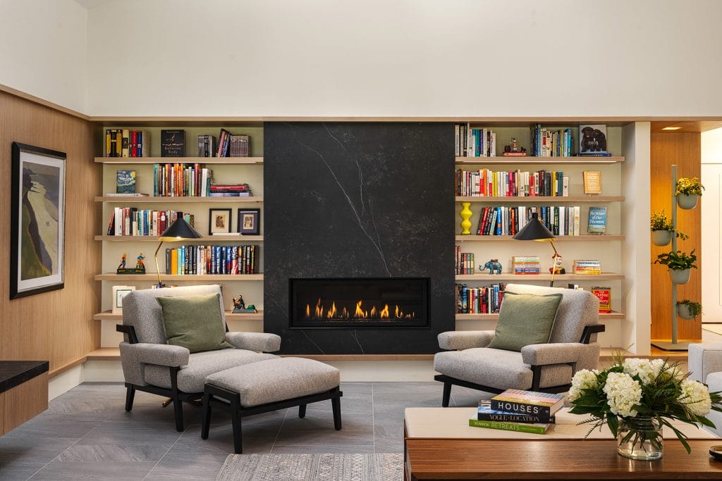 Functional basement library with a touch of elegance by Decorilla