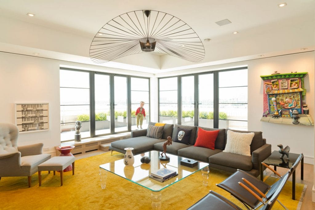 Loft furnishing ideas highlighting multipurpose furniture by Decorilla designer Susan W. 