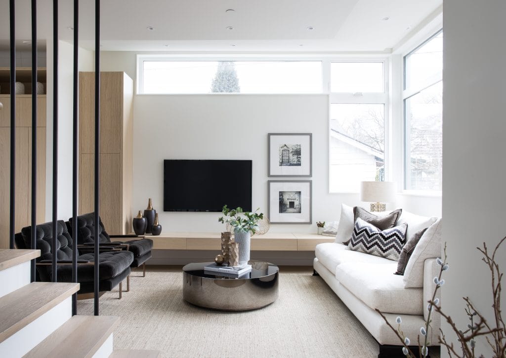 Minimalist white living room decor by Decorilla