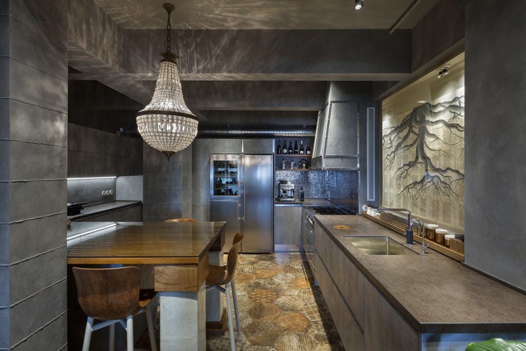 Sleek modern basement finishing in a kitchen by Decorilla