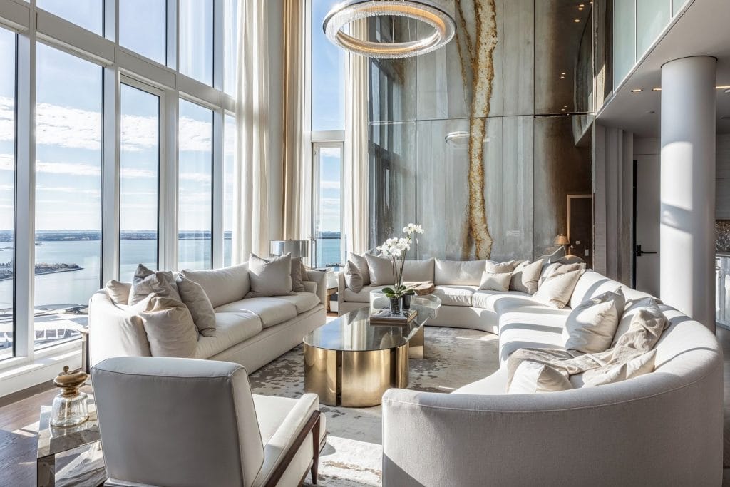 Sleek modern white living room ideas by Decorilla