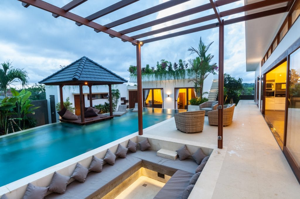 Tropical outdoor living space by Decorilla designer, Amelia R. 