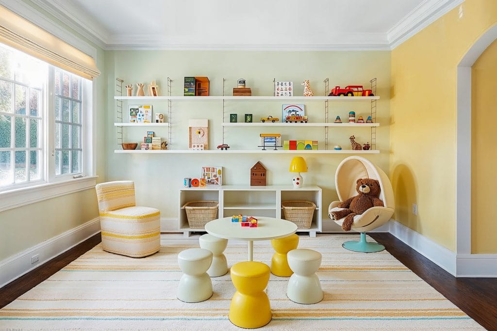 Butter yellow kid's room design by Decorilla
