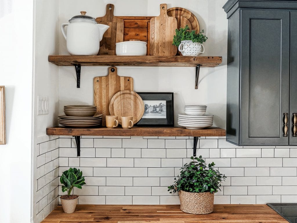 Chic small kitchen decor with a mix of modern and vintage elements by Decorilla