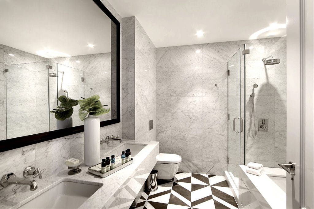 Elegant guest bath decor by DECORILLA