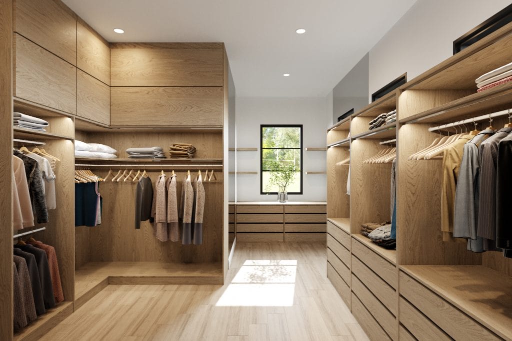 Sleek master closet layout with ample storage and modern fixtures by Decorilla