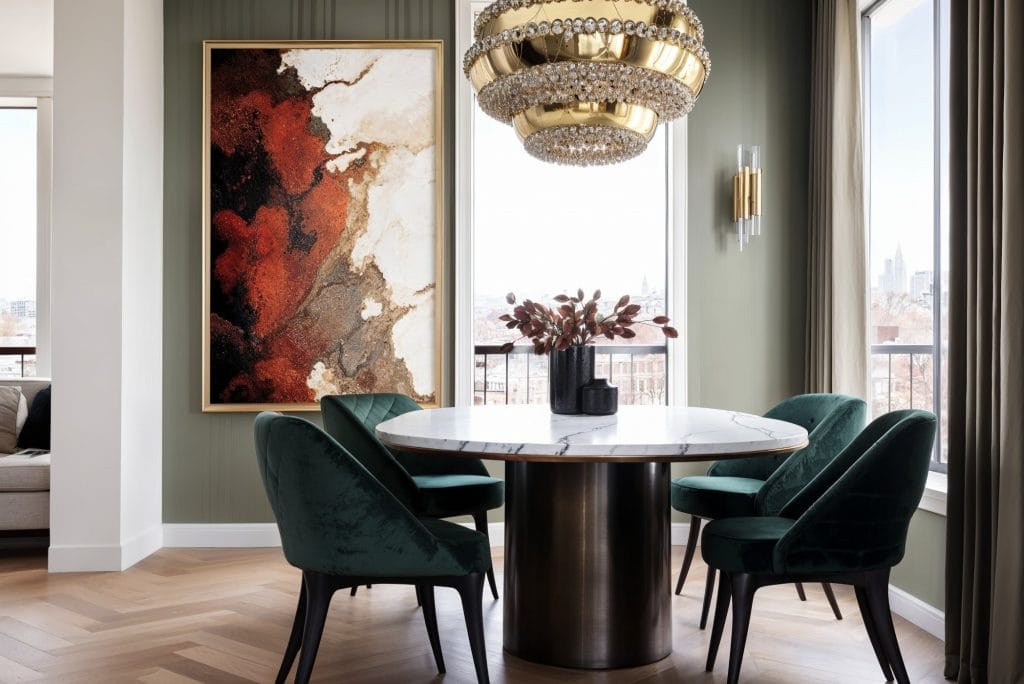 Statement metallic lighting fixtures in a dining room, luxury in home decor trends 2025 by Decorilla