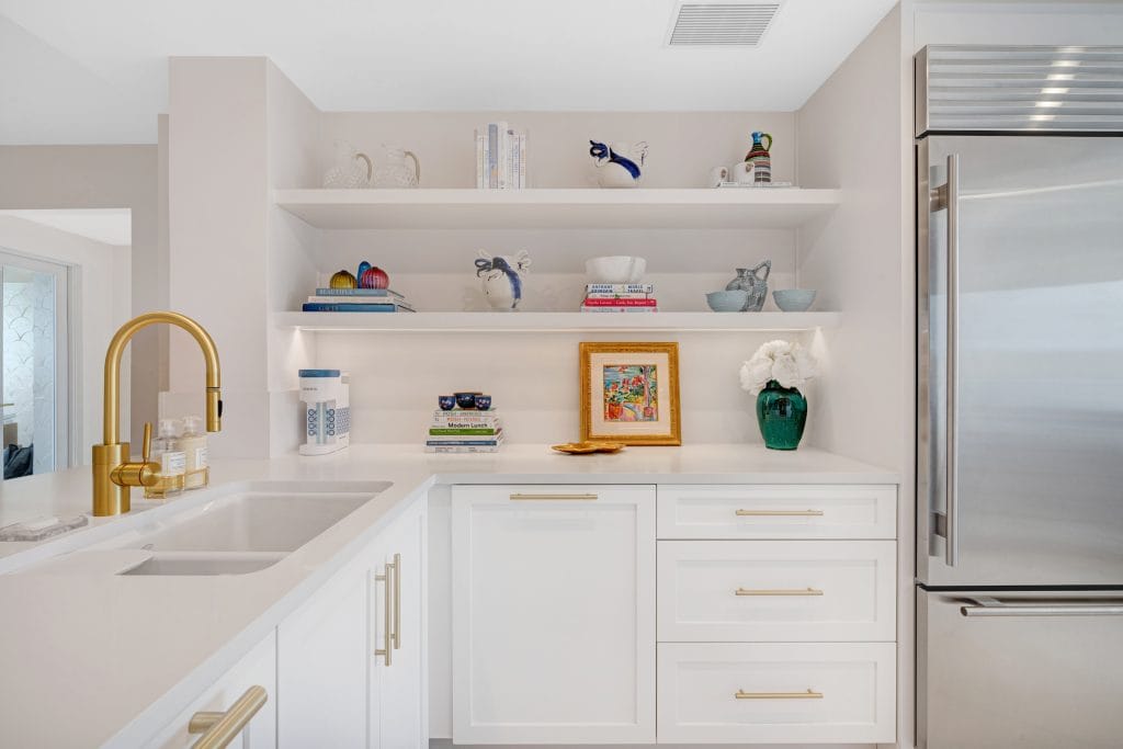 Bright and airy white kitchen renovation with natural light showing the new kitchen cost by Decorilla