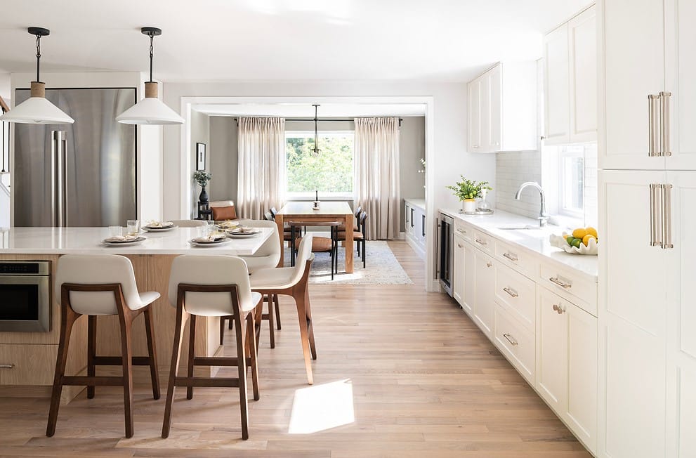 Contemporary kitchen redesign with integrated appliances demonstrating the cost to remodel a kitchen by Decorilla designer Christiane P. 