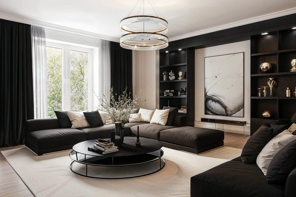 Modern living room with black accents exuding luxury in home decor trends 2025 by Decorilla