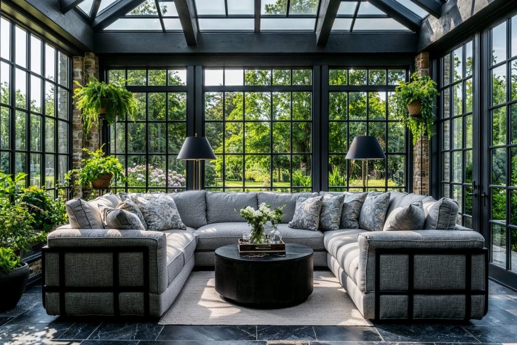 Modern sunroom interior design with clean lines and a monochromatic color palette by Decorilla