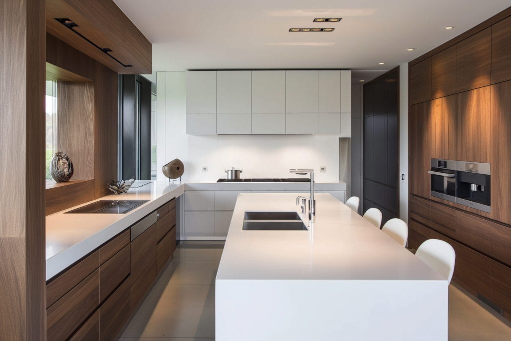 Soft, diffused hidden light is a hallmark of kitchen island lighting trends by Decorilla