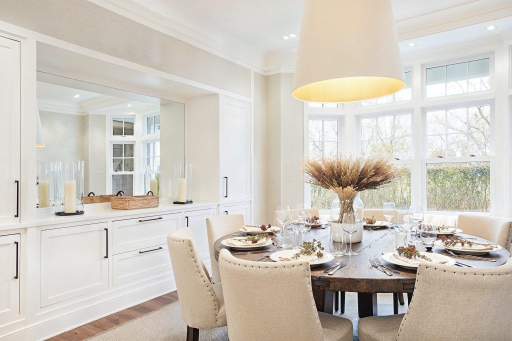 Transitional dining room with 2025 lighting trends by Decorilla designer, Peter C.