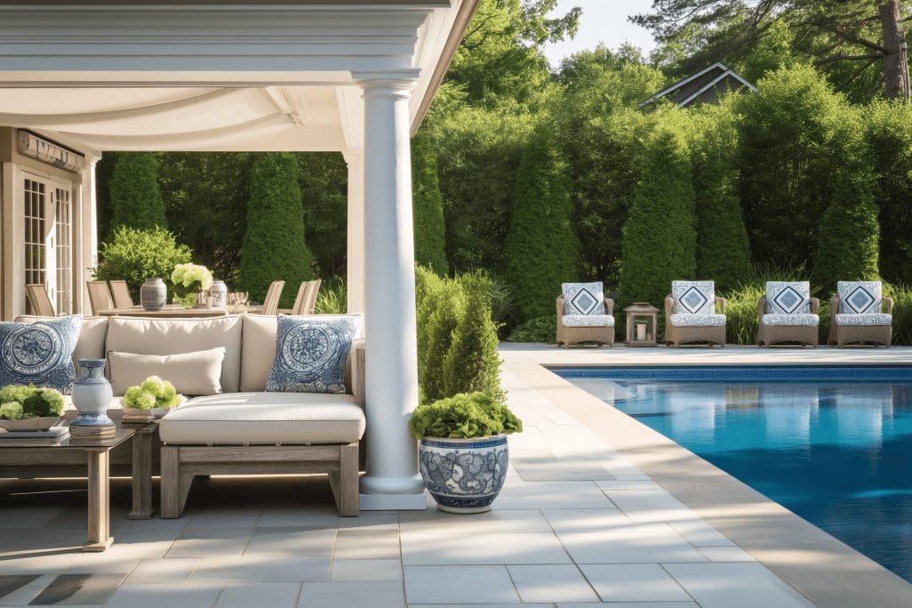 A chic outdoor space showcasing trending patio furniture for the season by Decorilla