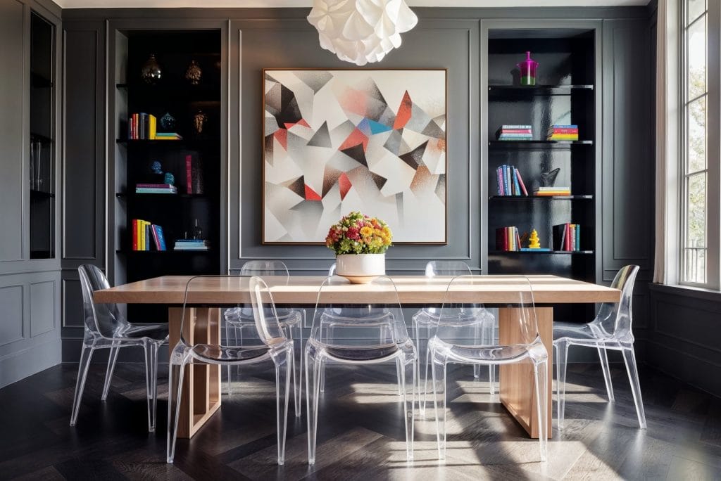 Dark, bold parquet patterns embraces 2025 flooring trends in a dining room by Decorilla