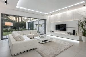 Modern white living room before and after by Decorilla