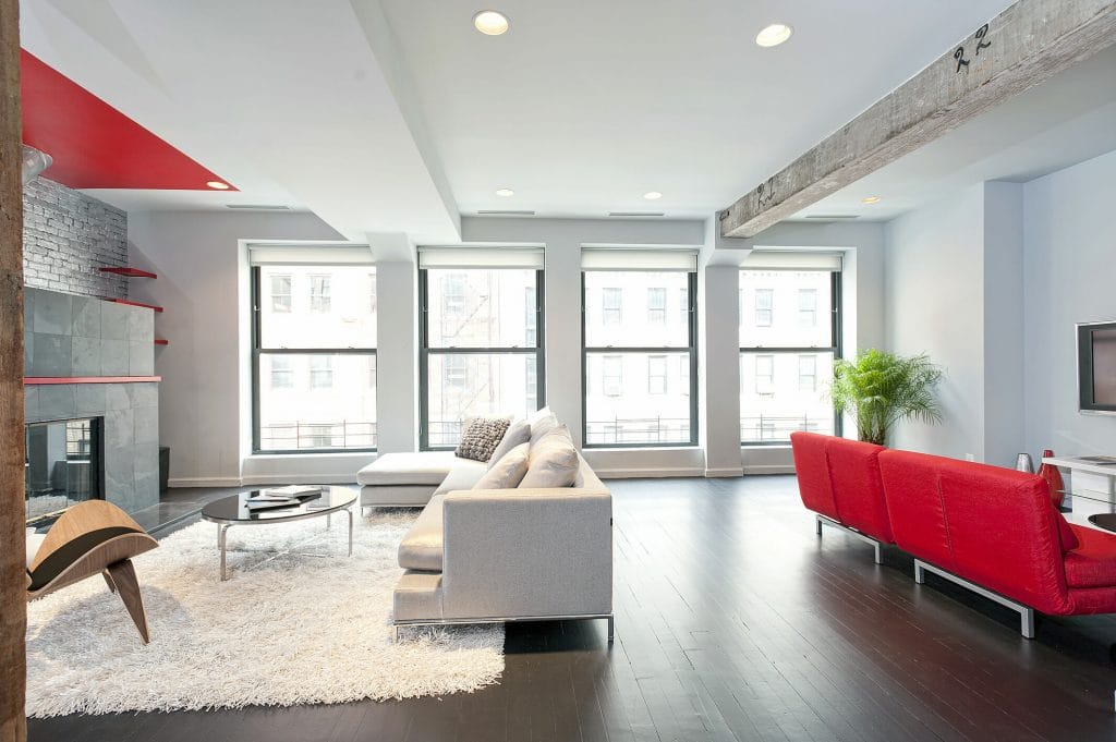 Contemporary condo with pops of unxpected red by Decorilla designer, Joyce T.jpg