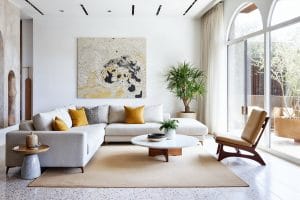 Contemporary living room with Terrazzo floor tiles by Decorilla