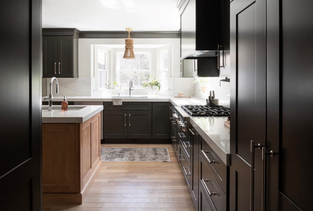 Contrasting two-tone cupboards and kitchen island, by Decorilla