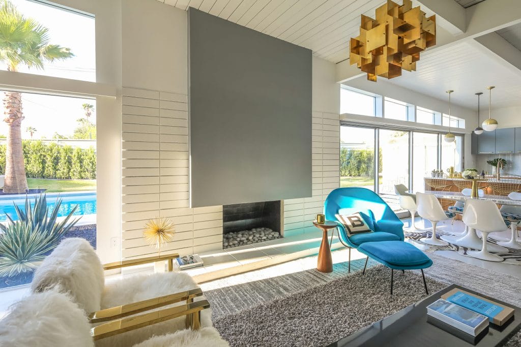 Geometric pendant light featured in a mid-cenutry living room by Decorilla designer, Michelle B.