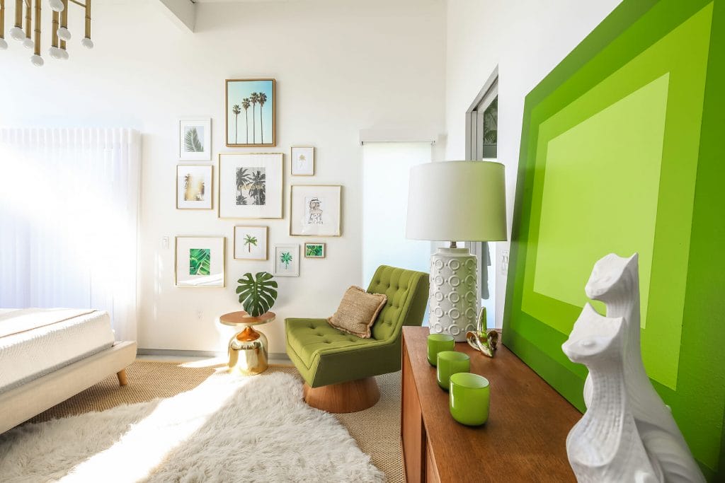 Layered green room decor ideas in vibrant spaces by Decorilla designer Michelle B. 