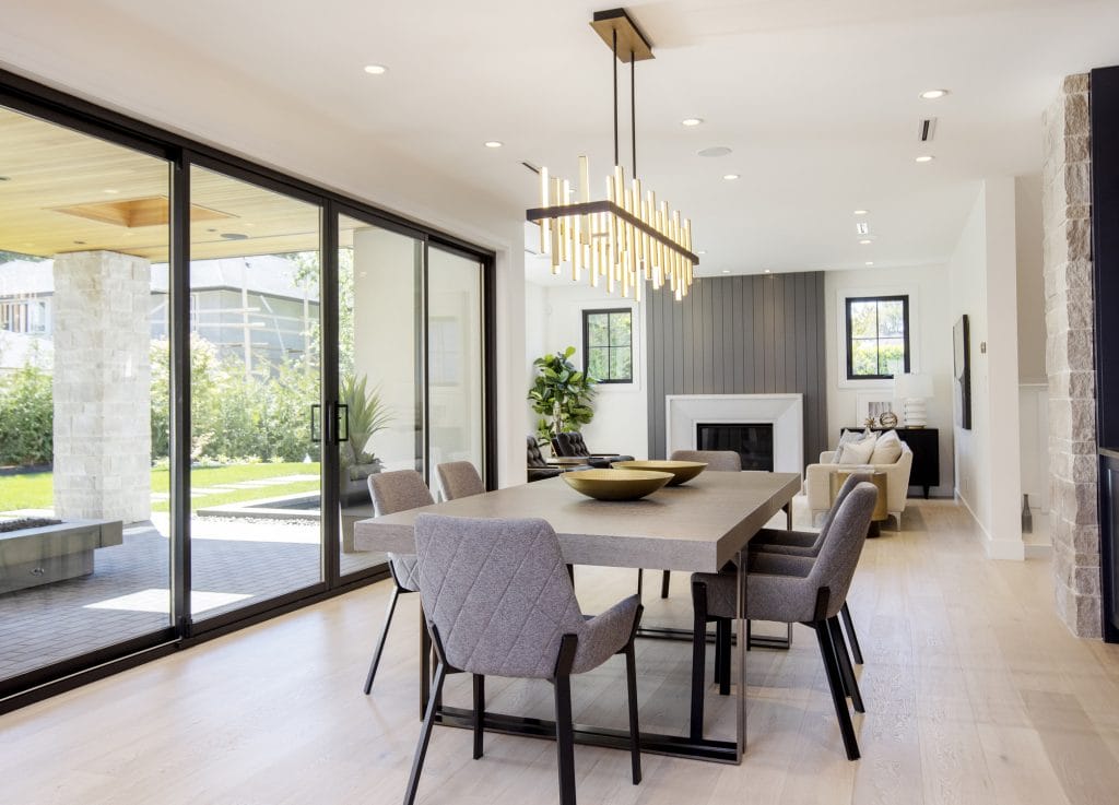 Modern open-concept dining room decor inspiration by DECORILLA designer Dina H.